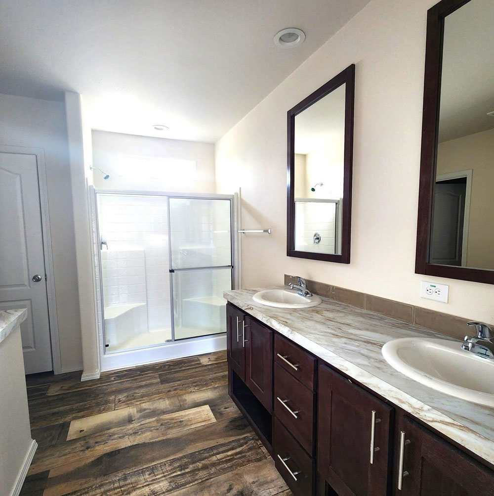 Double vanity sinks in 28664E The Rapids master bathroom