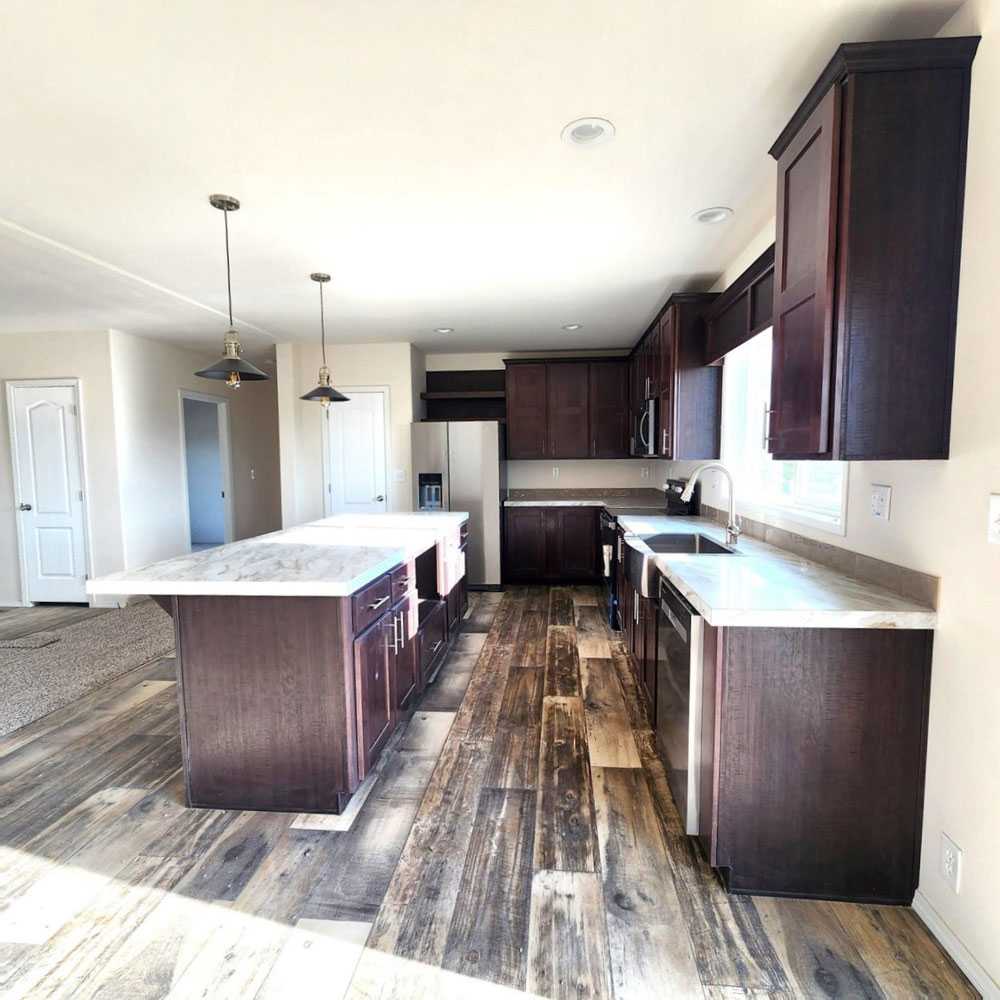 Solid wood cabinets with lots of storage in The Rapids model home