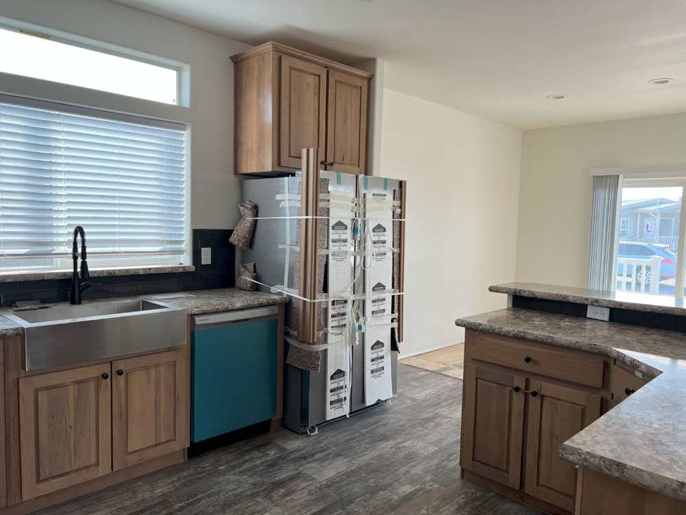 Stainless steel appliances featured in the Marlette Columbia River homes