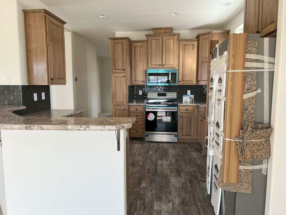 Modern kitchen with stainless steel appliances in the Marlette Columbia River