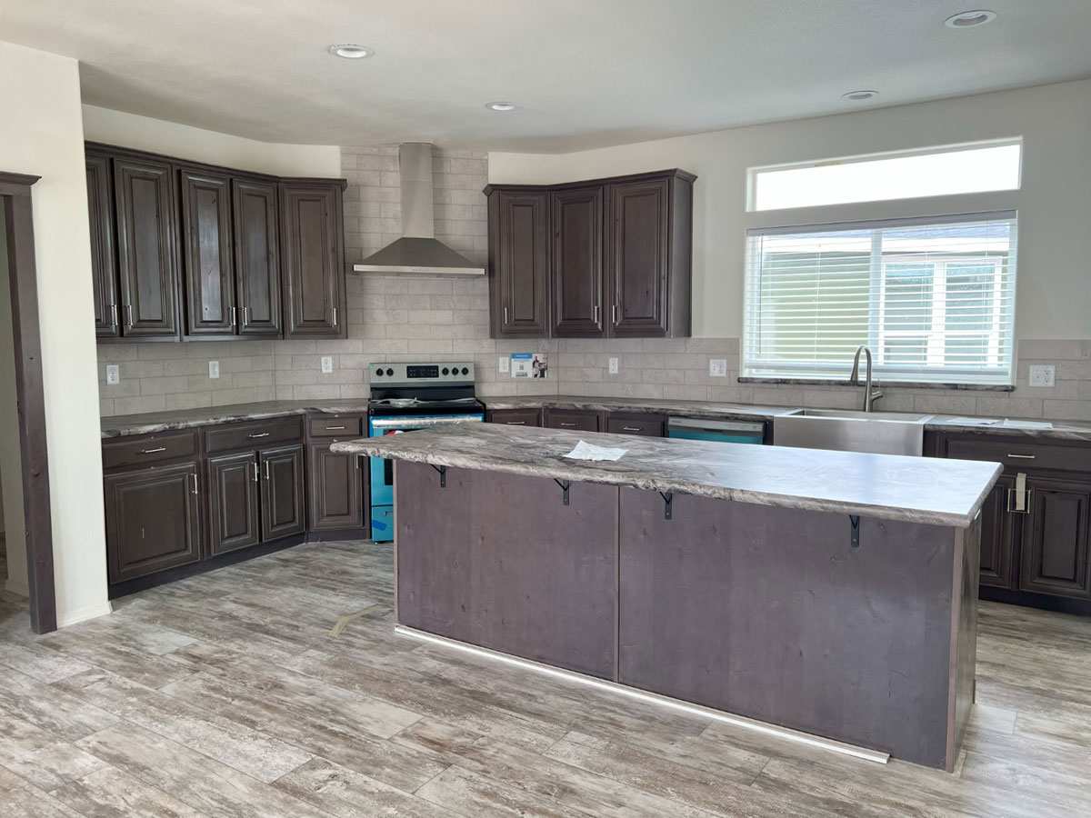 Huge kitchen island perfect for entertaining in the Marlette 2028.