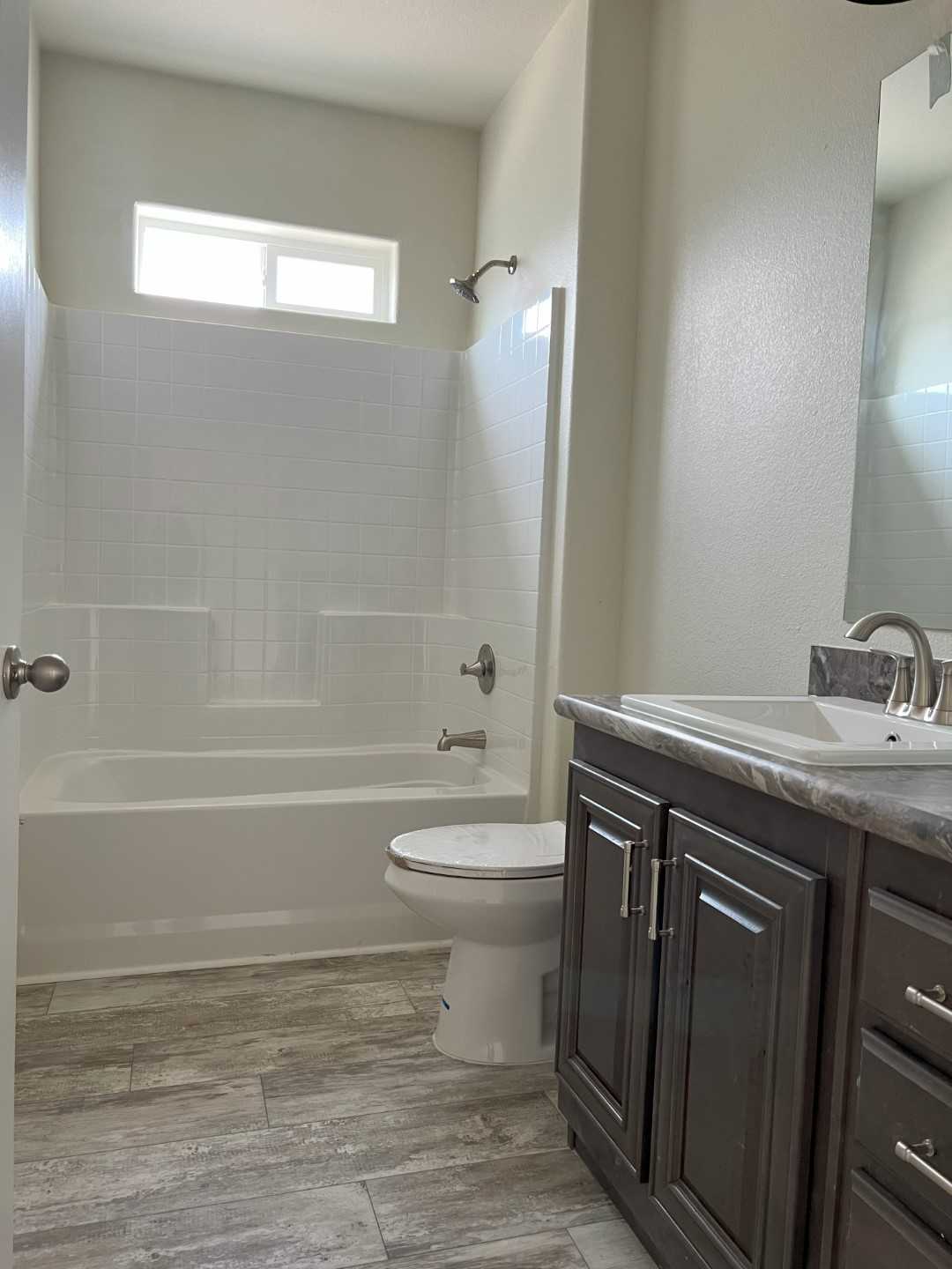 Lovely guest bath with china sink in the 2028 Marlette model.