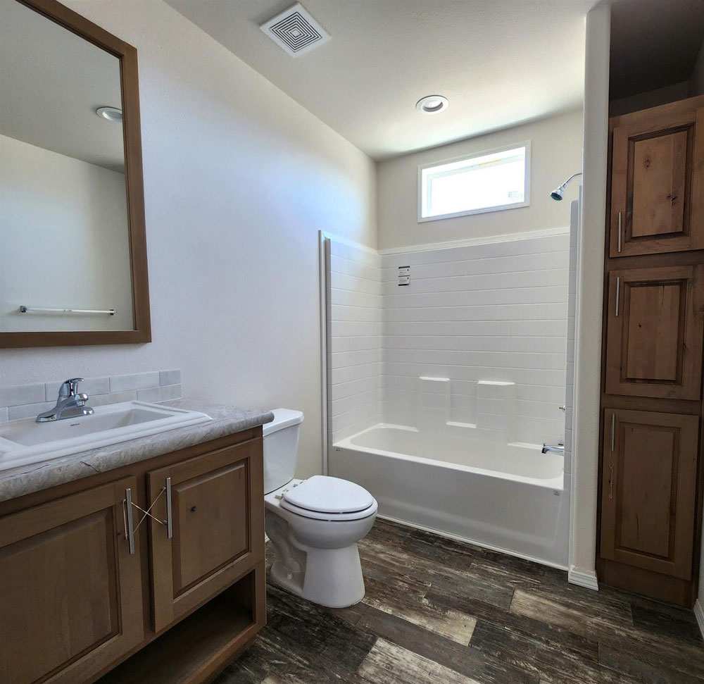 Bright second bath in the 28563N Fleetwood Sunbeam home