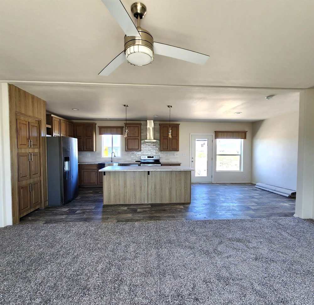 Open concept living room in the Fleetwood Sunbeam 28563N