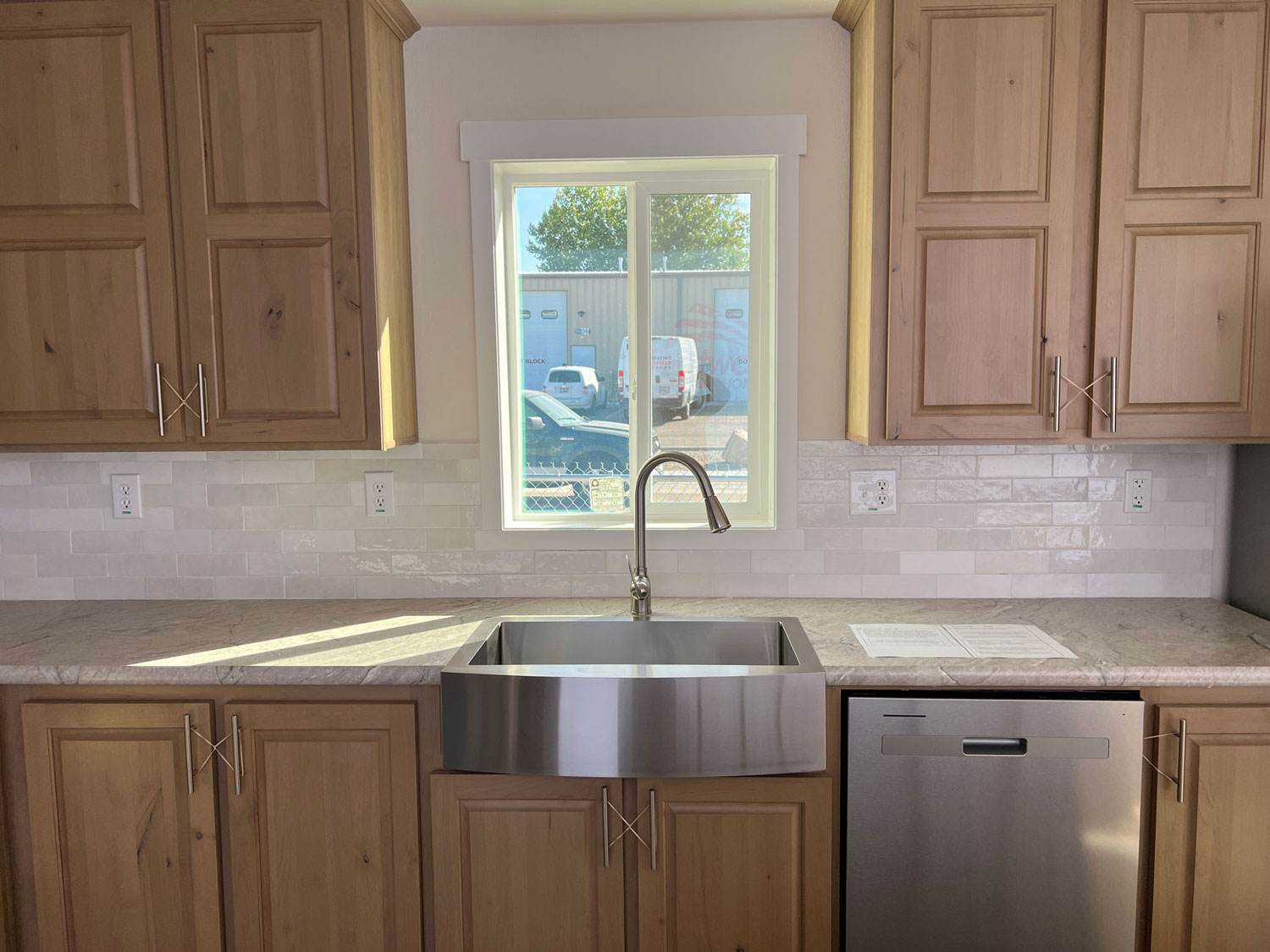 Farmhouse stainless steel sink enhances The Sawtooth’s modern kitchen