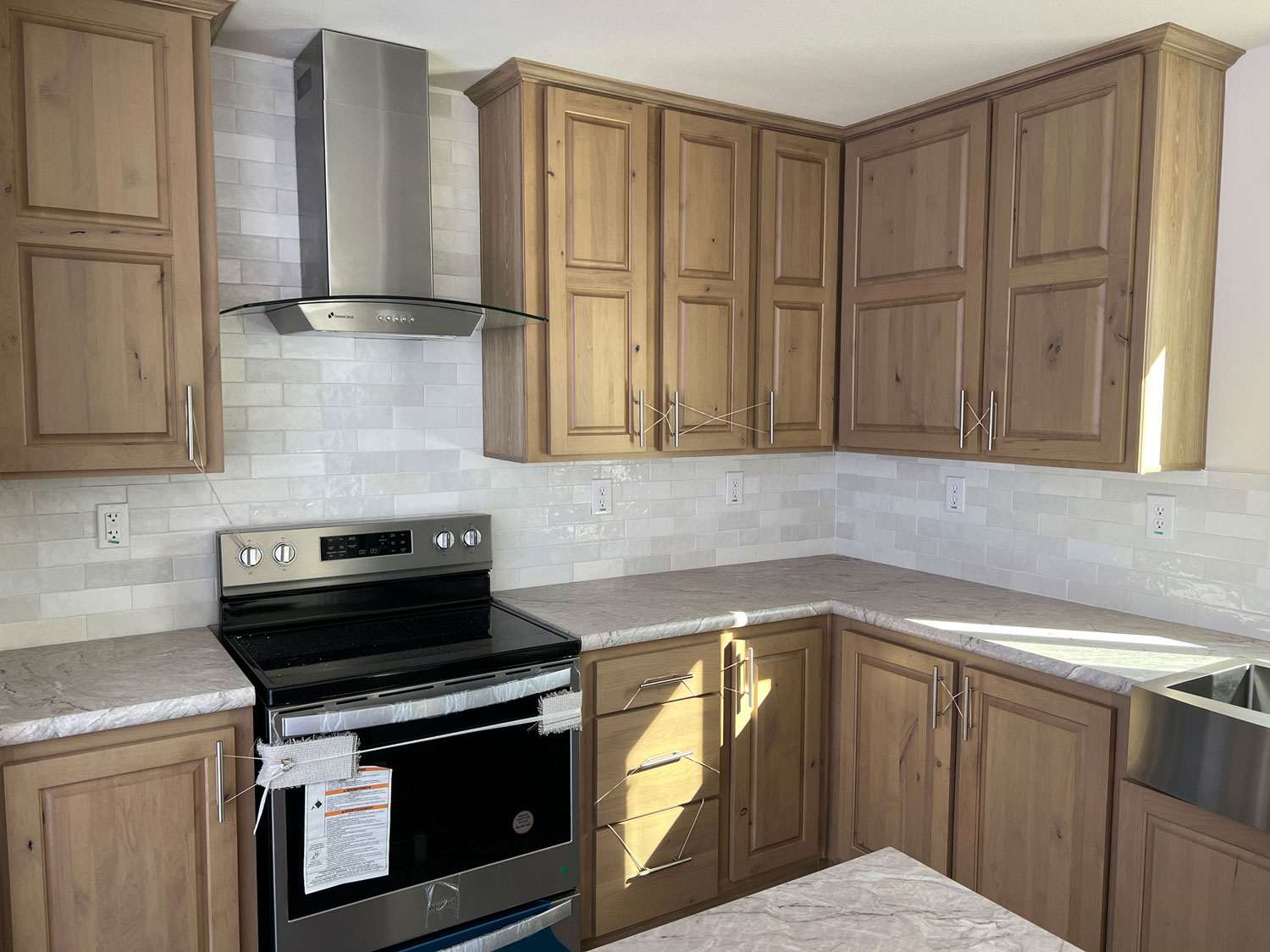 The Sawtooth kitchen features solid wood cabinets for durability and style