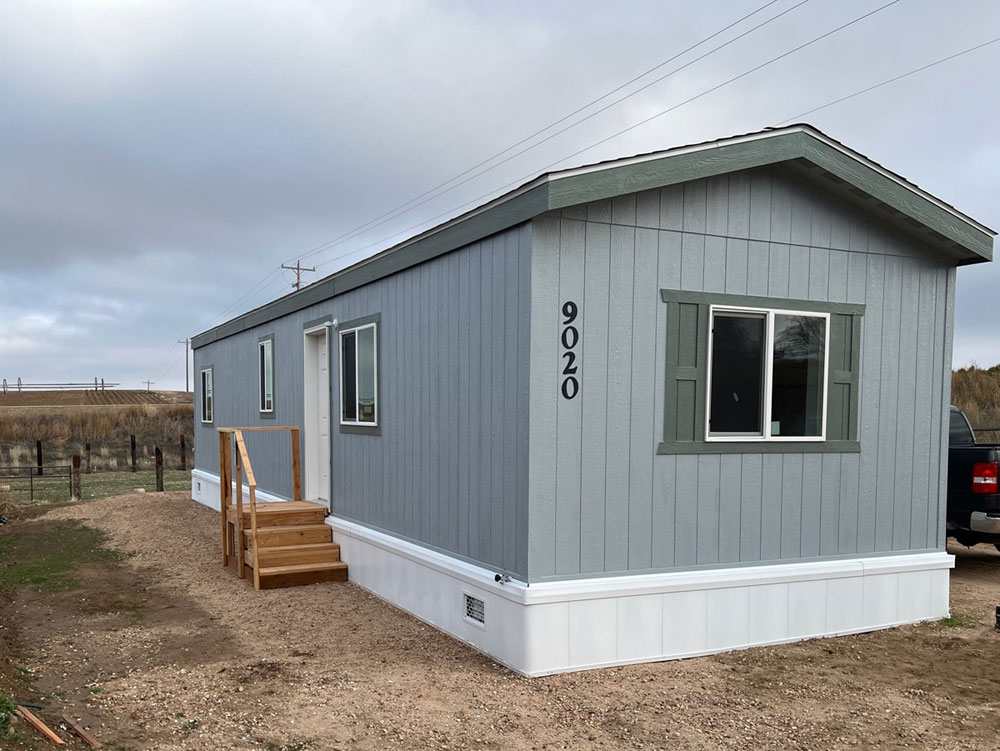 Charming exterior of the Fleetwood Broadmore 14482B mobile home