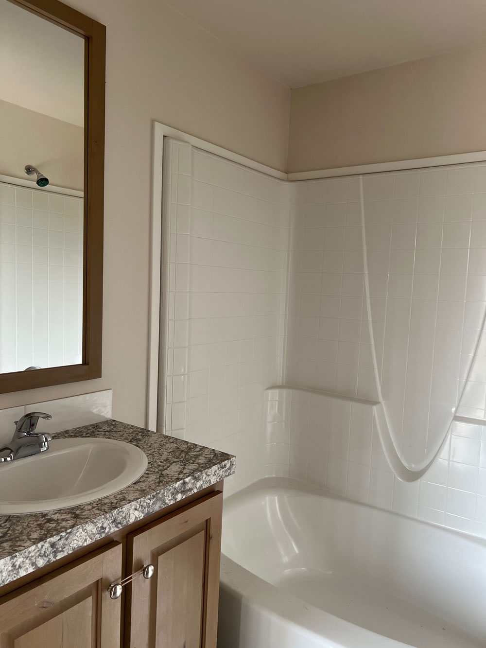 Small but functional bathroom in the Fleetwood 14482B singlewide home