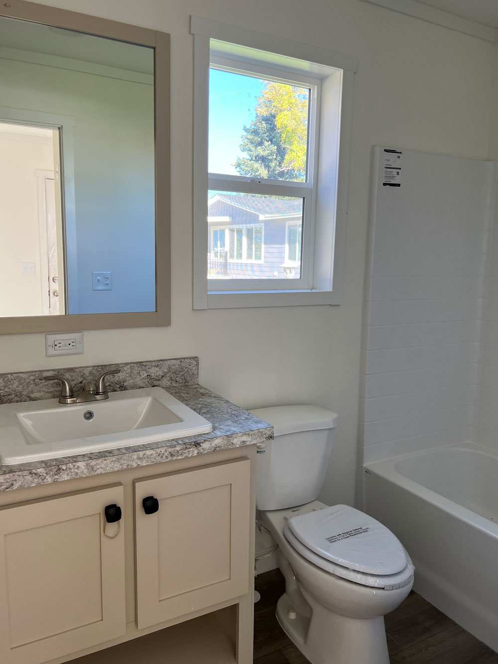 Nice bathroom with ample storage in the Clayton Tempo Imagine home
