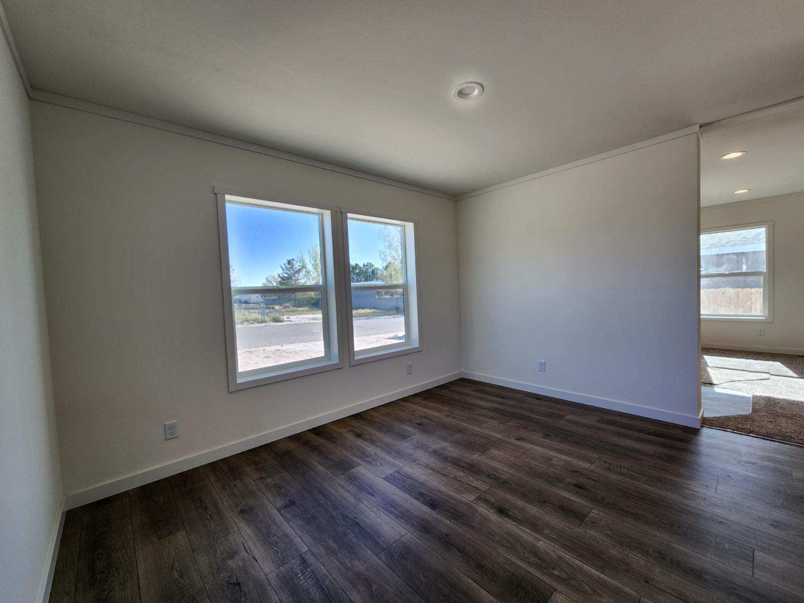 Bright dining or flex room with energy-efficient windows in Johnny B Goode