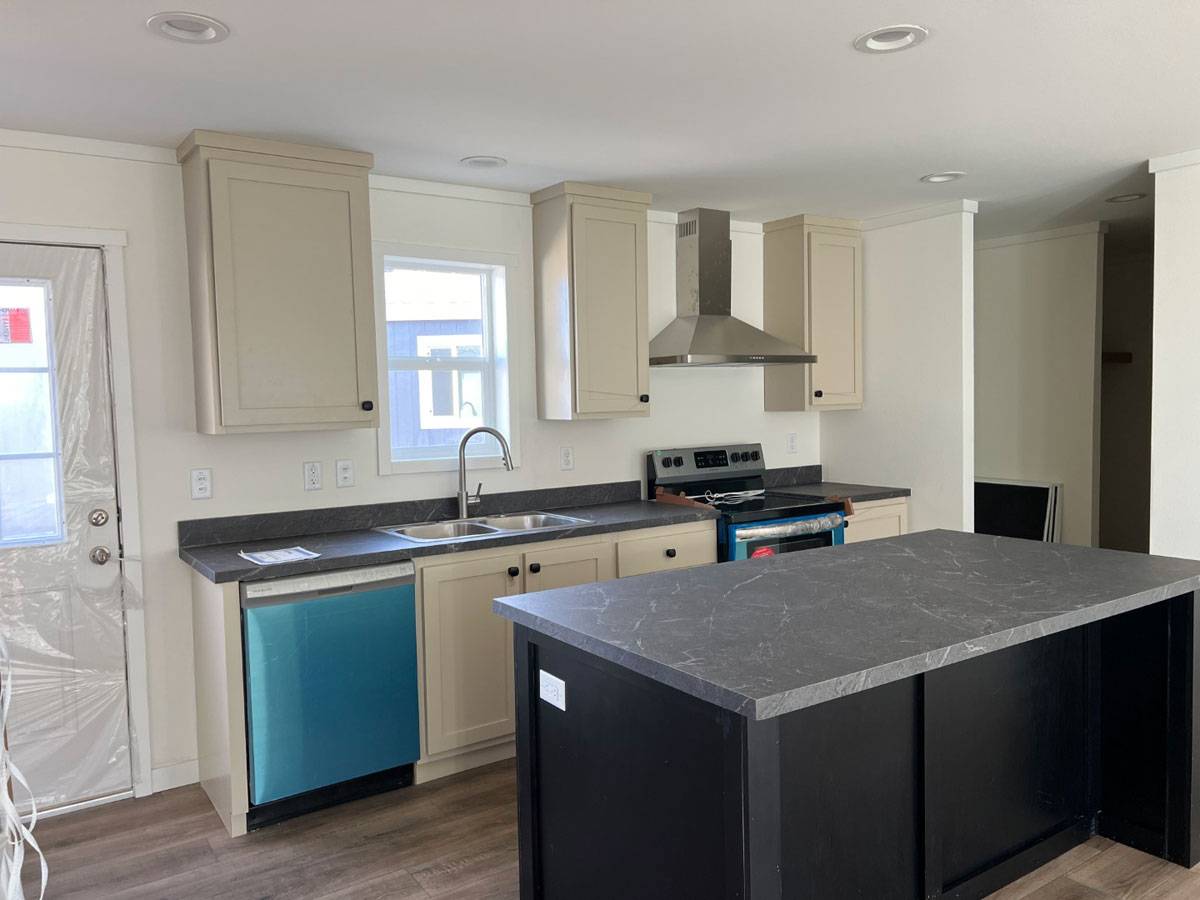 Large kitchen island and adjacent pantry make Rocket Man ideal for families