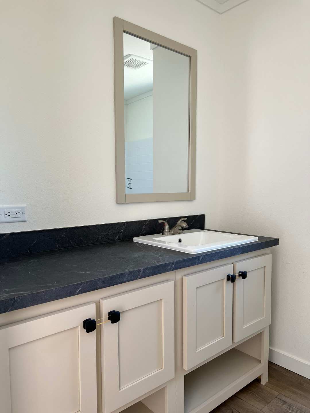 Well-appointed guest bath with plenty of counter space in Rocket Man.