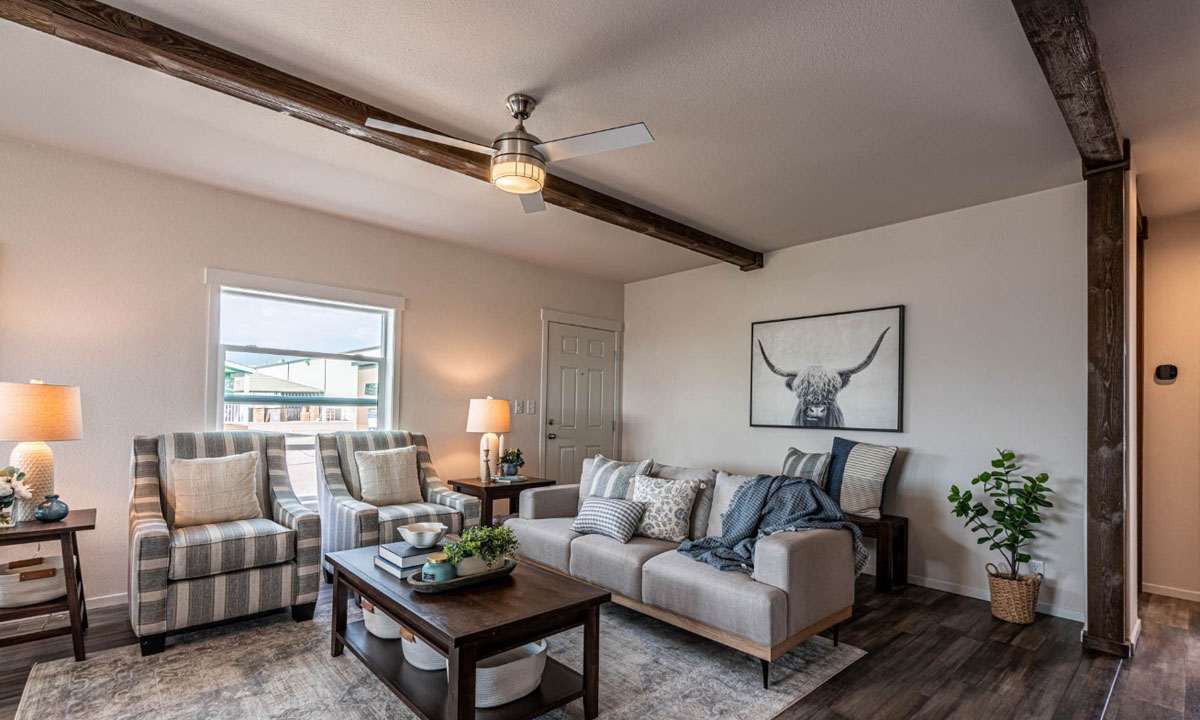 Bright, airy living room in The Opal by Fleetwood Mobile Homes.