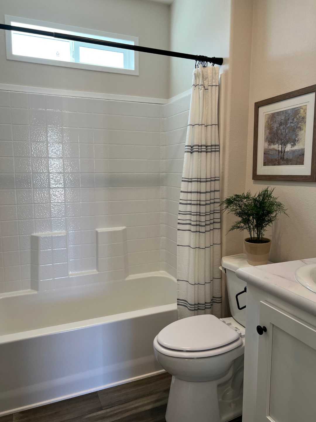 Charming second bath in The Opal by Fleetwood Mobile Homes.