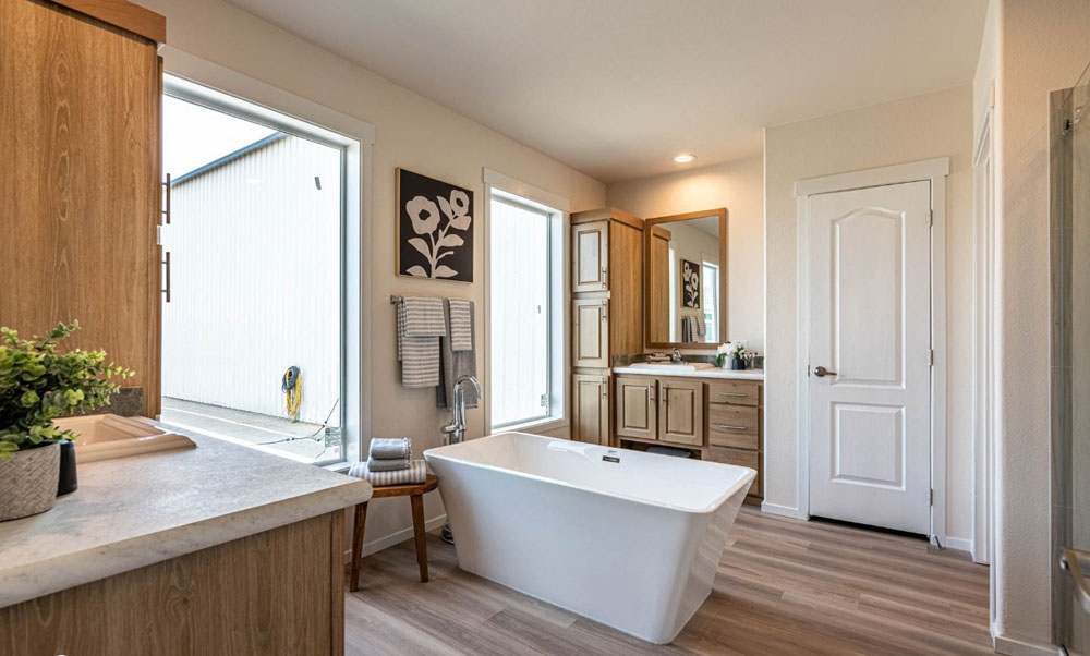 Modern standalone tub as the focal point in the 30684E bath