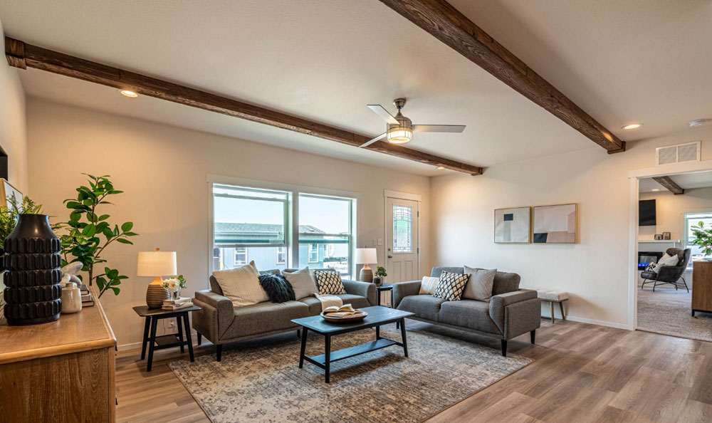 Warm and inviting living room in the Fleetwood 30684E Shoshone