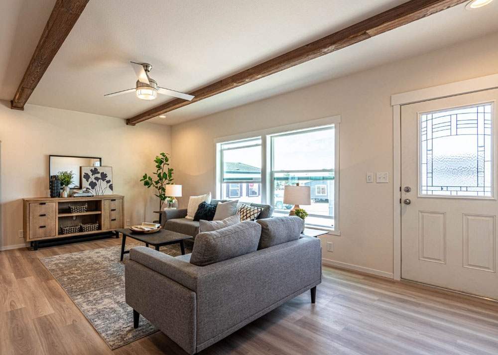 Wood beams add warmth to the 30684E Fleetwood Shoshone home