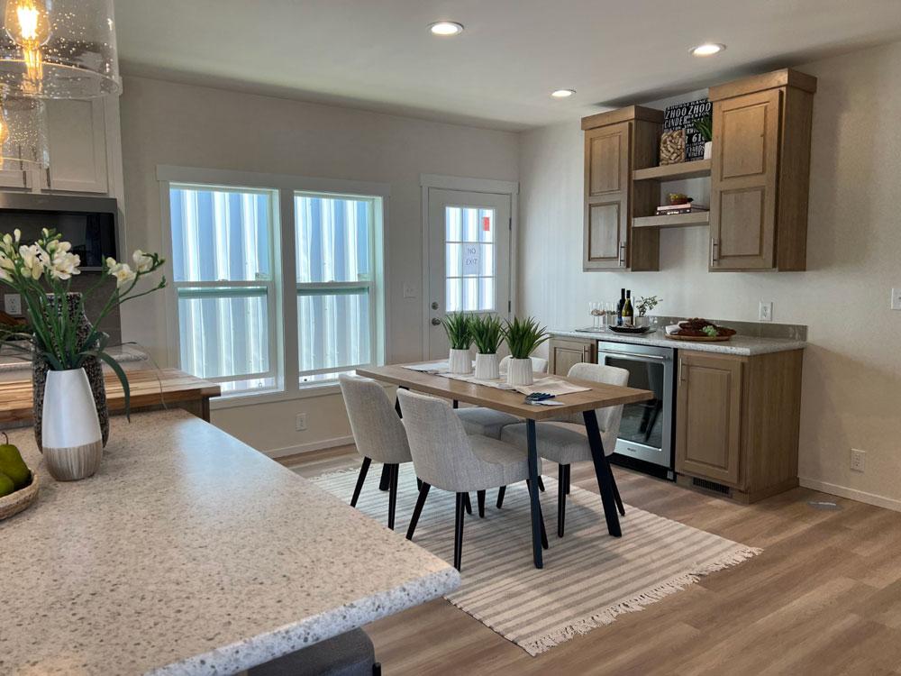 Dining room with wine fridge in this Fleetwood Waverly Crest Home