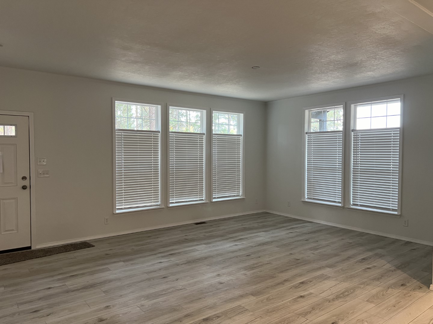 Open concept living room with tons of natural light on the Champion CB4442C